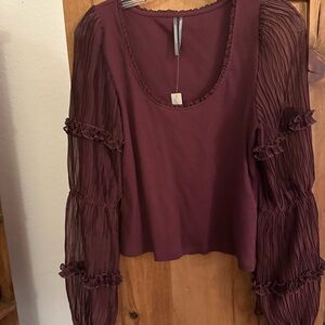 Anthropologie mixed fabrication top.Knit rib body and woven novelty sleeves.